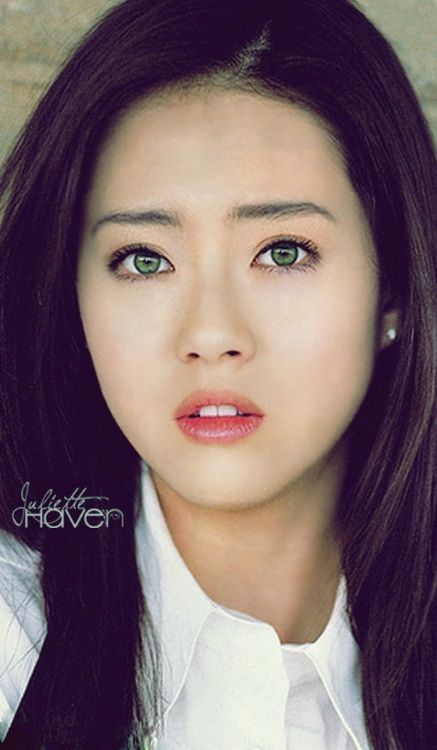 Asian woman with green eyes