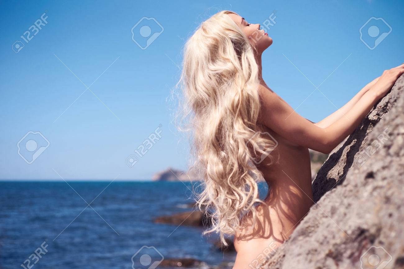 Cute blonde girl nude beach