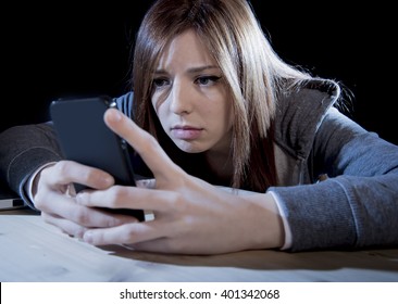 Dark black young teen cell phone