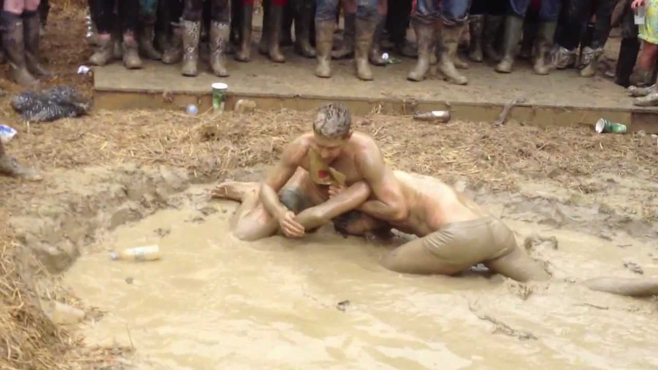 Naked nude mud wrestling