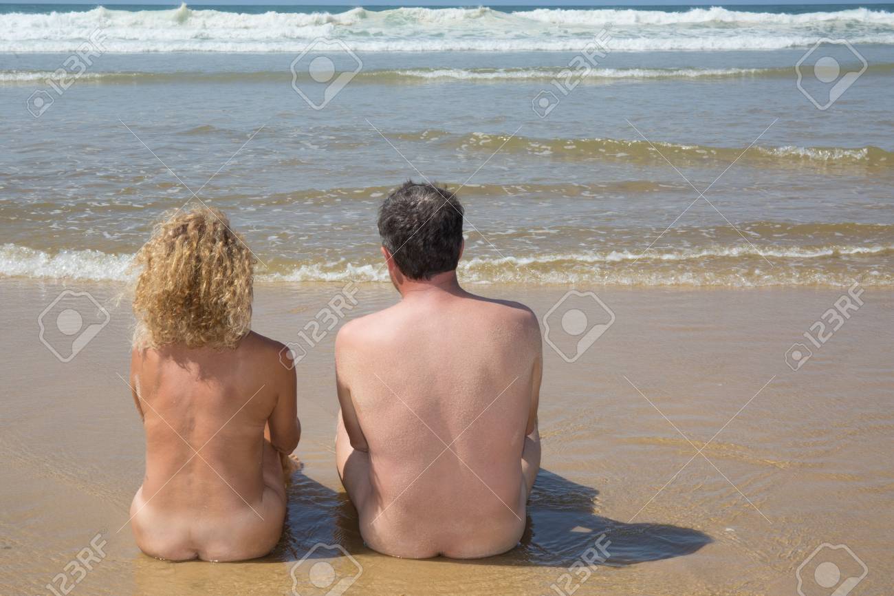 Naked couple on the beach nude