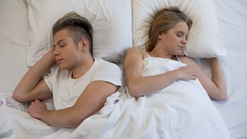 Young teen couple bed