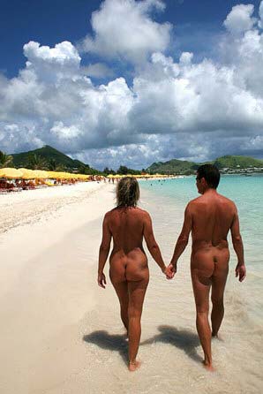 Playing at nude beach couples