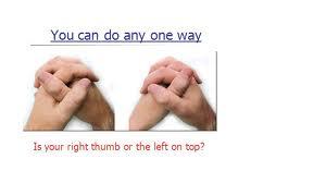 Left thumb over right