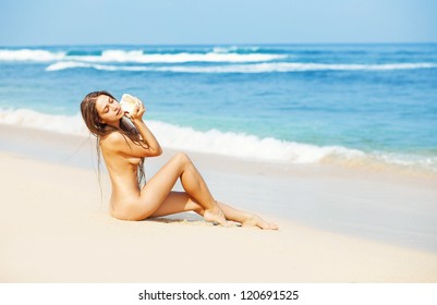 Cute blonde girl nude beach