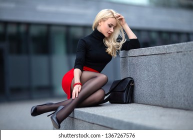 Blonde woman in panthyhose heels