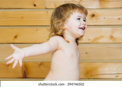 Nudist toddler girls playing