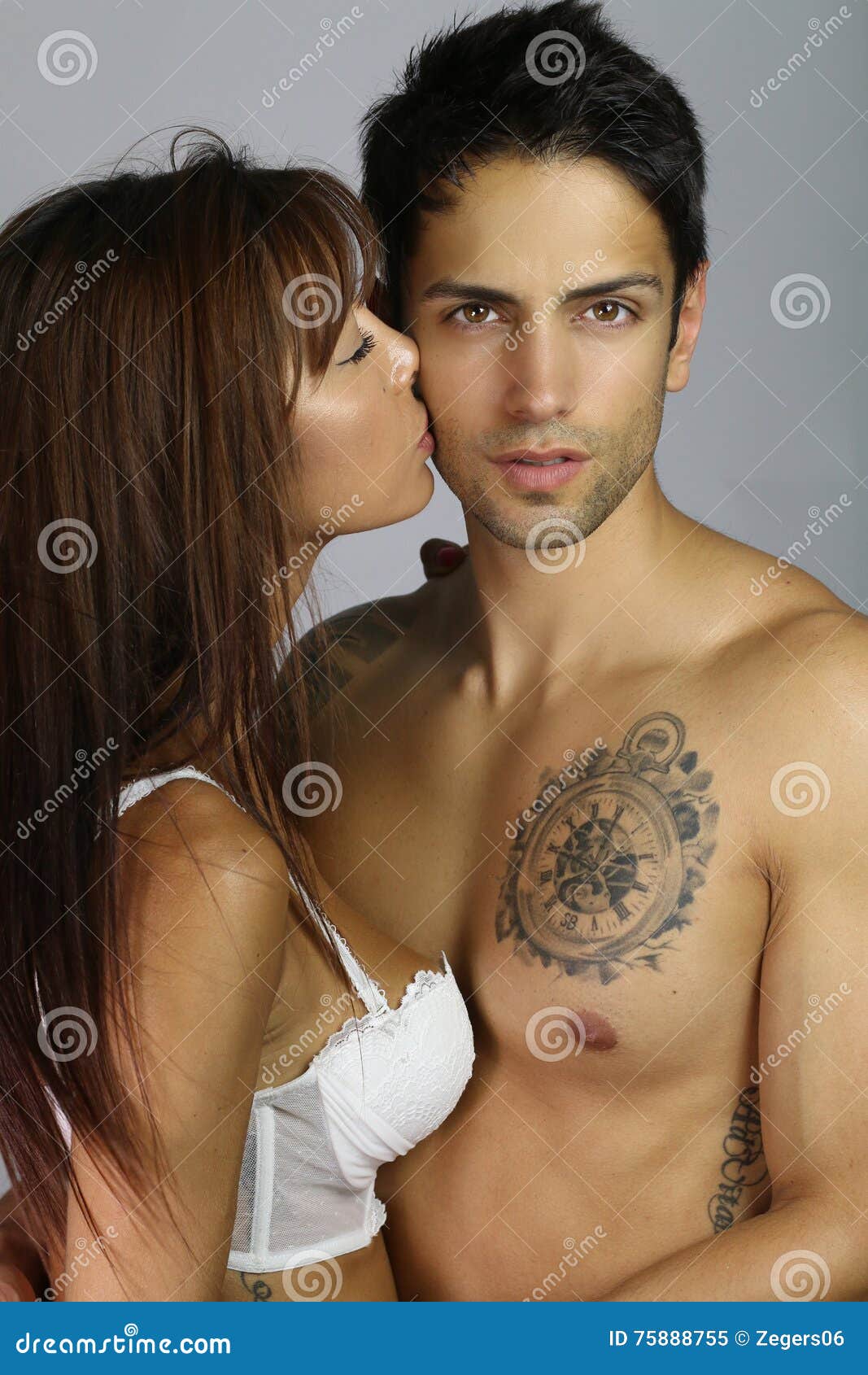 Beautiful naked women kissing man