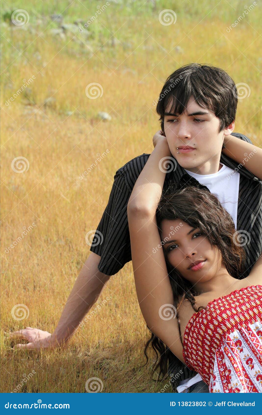 Young teen boy and girl couple