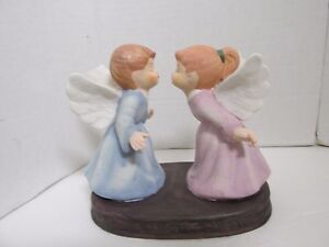 Vintage kissing angels figurine